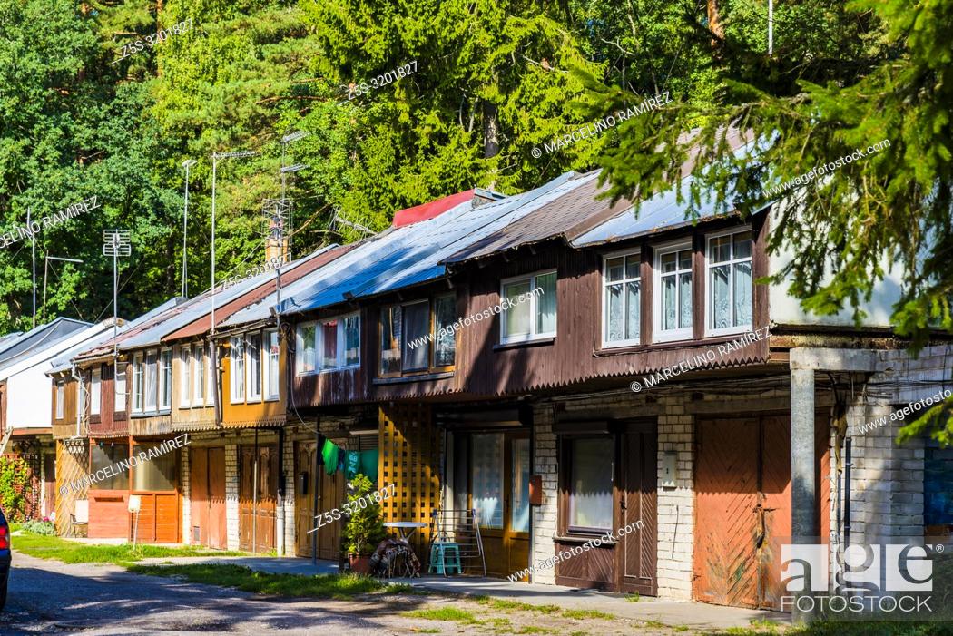 Stock Photo: Wooden houses. Juodkranteis a quiet Lithuanian seaside resort village located on the Curonian Spit. Curonian Spit. Juodkrante, Neringa Municipality.
