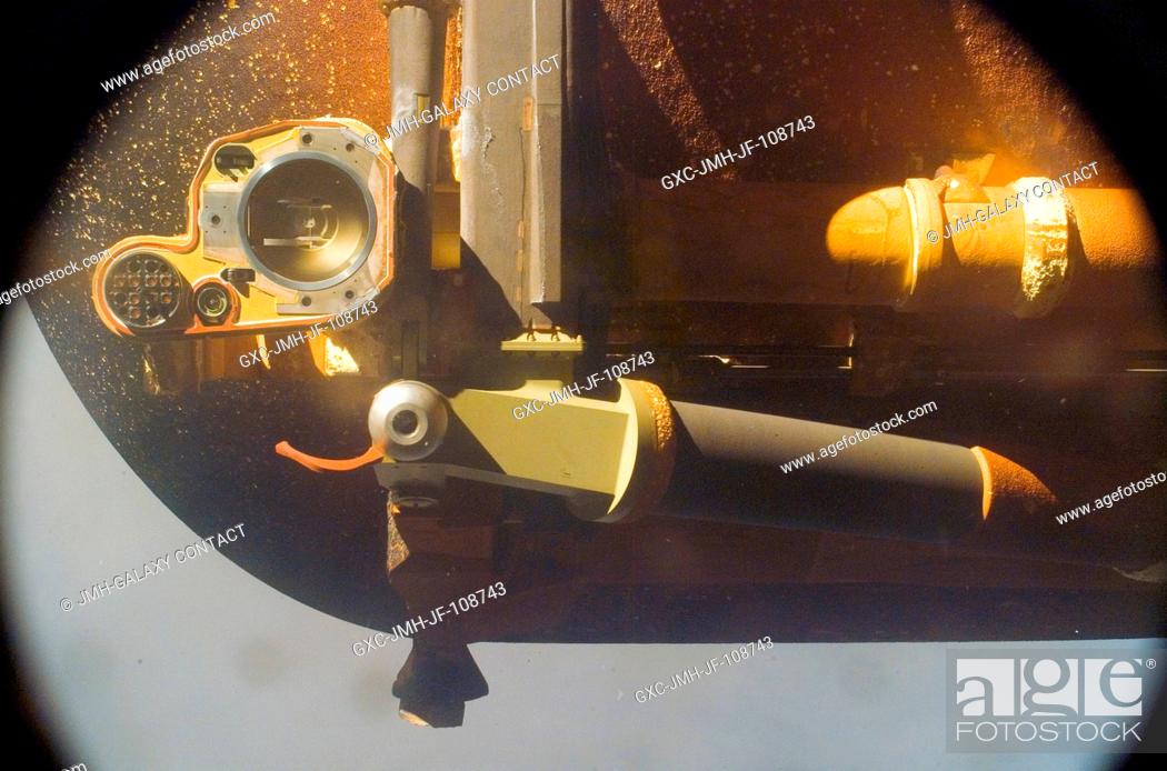 Stock Photo: This medium close-up picture showing the bottom aft portion of the STS-118 external tank was photographed by a camera positioned in Endeavour's umbilical well.