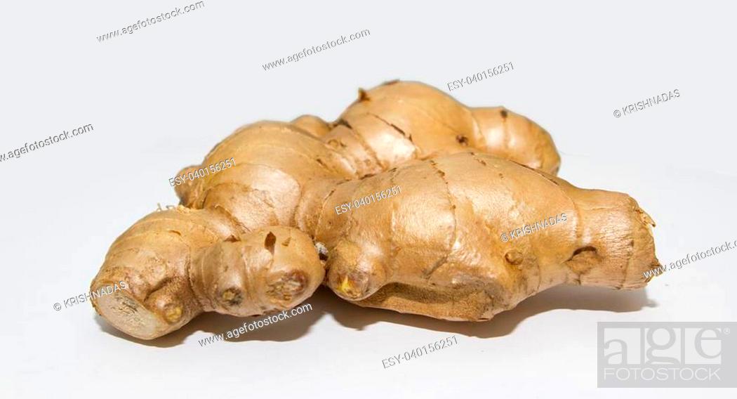 Stock Photo: Ginger or ginger root is the rhizome of the plant Zingiber officinale, consumed as a delicacy, medicine, or spice.