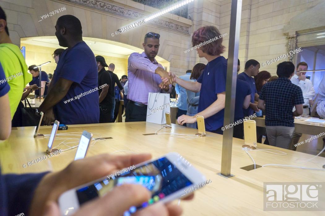 Stock Photo: A customer in the Apple store in Grand Central Terminal in New York after buying a new iPhone 8 on Friday, September 22, 2017, the first day it went on sale.