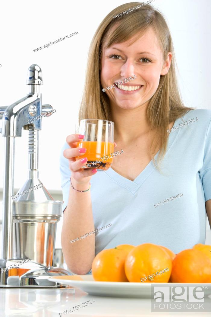 Stock Photo: Woman with assorted citrus fruits and orange juice, isolated.