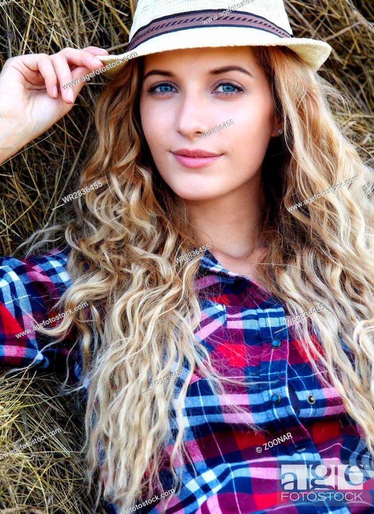 Pretty Blonde Girl With Blue Eyes
