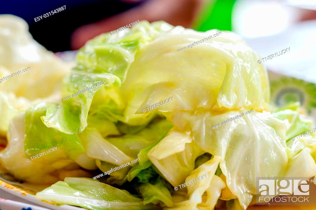 Stock Photo: stir-fried cabbage with fish sauce.