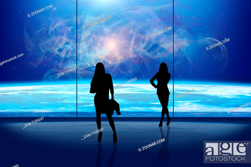 Photo de stock: Business ladies in front of the window at night.