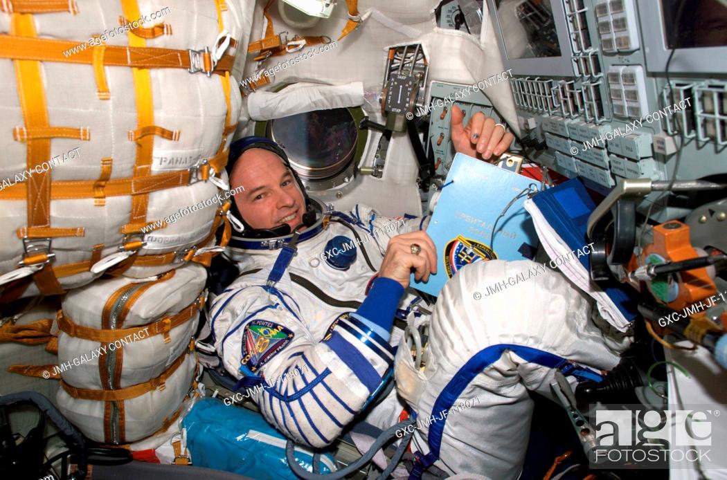 Stock Photo: Attired in a Russian Sokol launch and entry suit, astronaut Jeffrey N. Williams, Expedition 13 NASA space station science officer and flight engineer.
