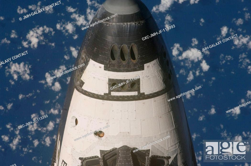 Stock Photo: This view of the crew cabin of the Space Shuttle Endeavour was provided by an Expedition 20 crewmember during a survey of the approaching vehicle prior to.