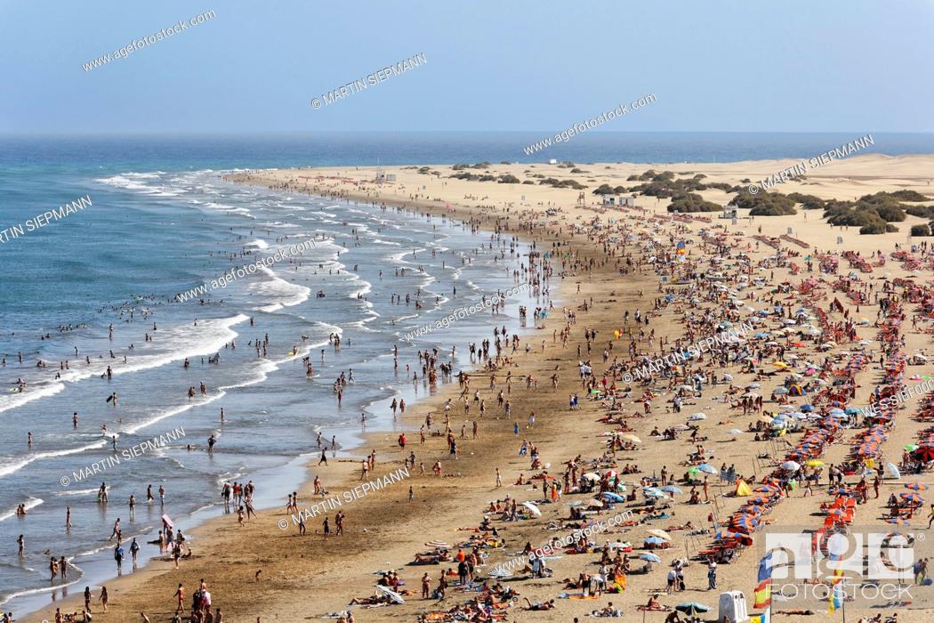 Stock Photo: Spain, Gran Canaria, Costa Canaria, Playa del Ingles, Tourist on beach.