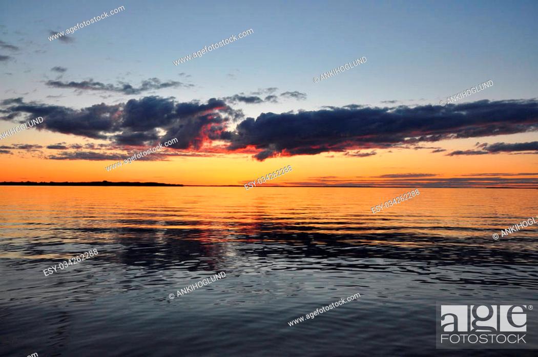 Stock Photo: Sunset over lake Vättern in Sweden.