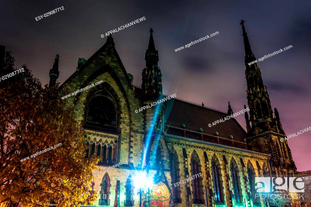 Stock Photo: Mount Vernon Place United Methodist Church at night in Baltimore, Maryland.