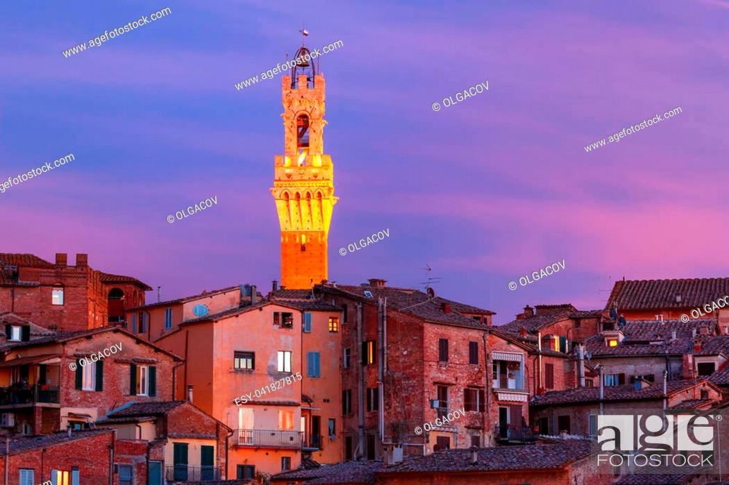 Stock Photo: Mangia Tower or Torre del Mangia and Old Town of medieval city of Siena at gorgeous sunset, Tuscany, Italy.