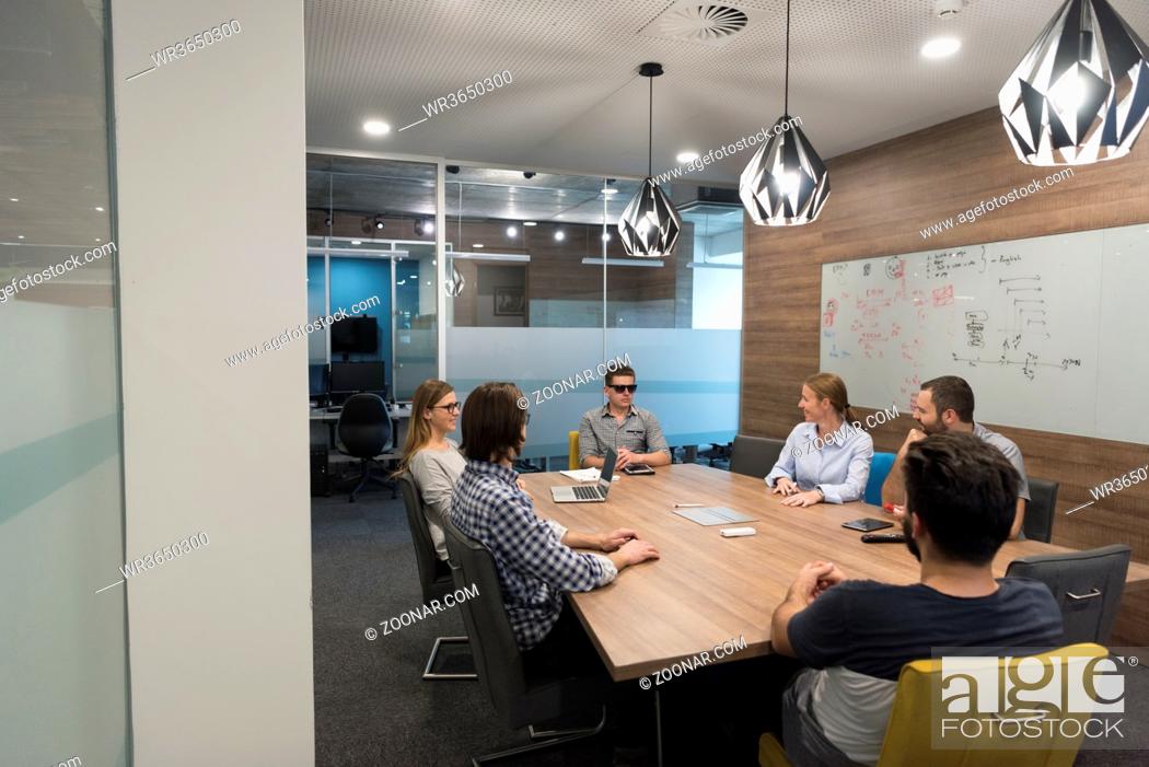 Stock Photo: startup business team brainstorming on meeting  working on laptop and tablet computer.
