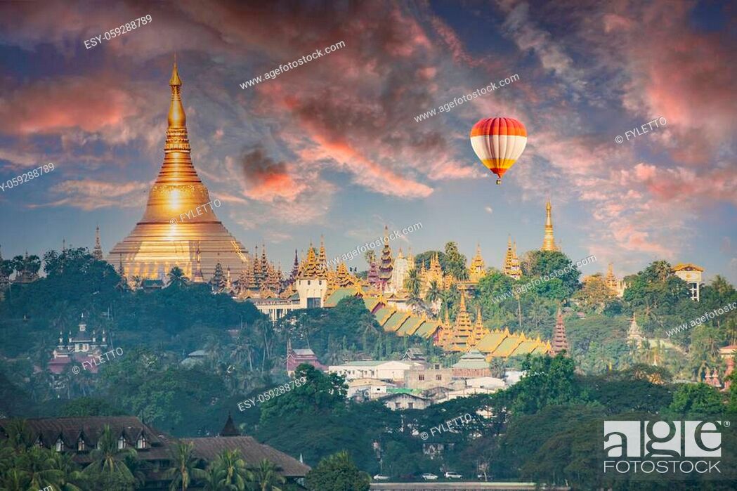 Stock Photo: Ballon flying over Shwedagon Pagoda, the most sacred golden Buddhist temple in Myanmar. It is located on the Singuttara hill in Yangon, Myanmar.