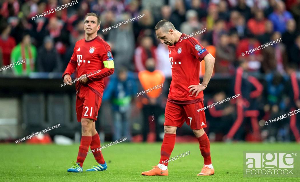 Stock Photo: Bayern Munich's Franck Ribery (r) and Philipp Lahm (l) react during the UEFA Champions League semi final soccer match FC Bayern Munich vs Atletico Madrid in.