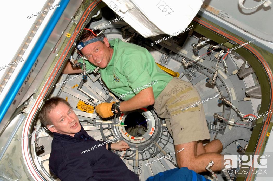Stock Photo: European Space Agency astronauts Frank De Winne (left), Expedition 20 flight engineer; and Christer Fuglesang, STS-128 mission specialist.