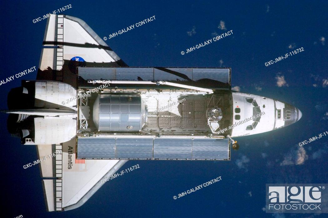 Stock Photo: A nadir view of the space shuttle Atlantis and its payload was provided by one of a series of images showing various parts of the shuttle in Earth orbit.