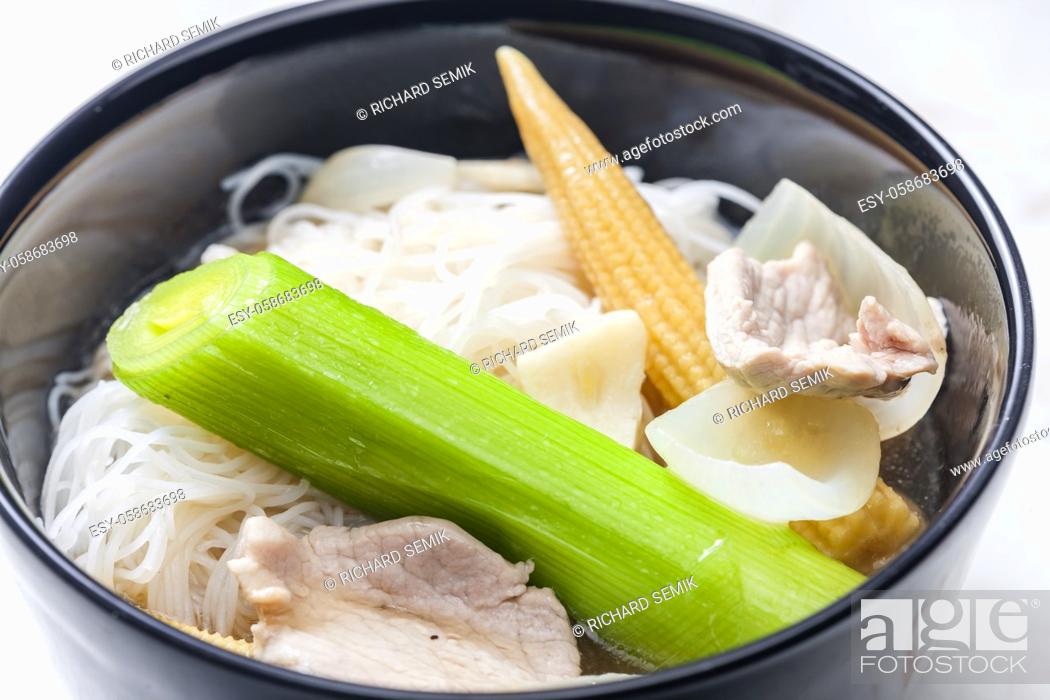 Stock Photo: soup pho with vegetables and rice noodles.