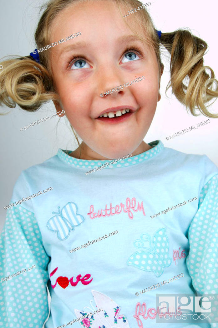 Little girl with pigtails bottom view makes some funny faces, Stock Photo,  Picture And Rights Managed Image. Pic. N62-437389 | agefotostock
