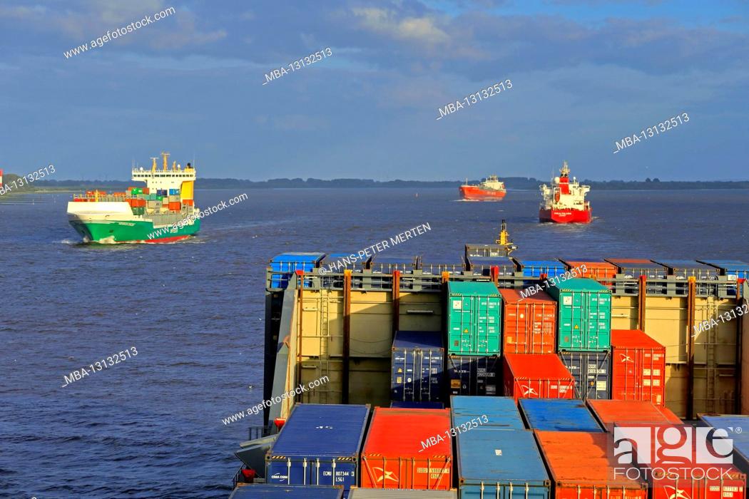 Stock Photo: Container ships on the Elbe near Stade, Lower Saxony, Germany.