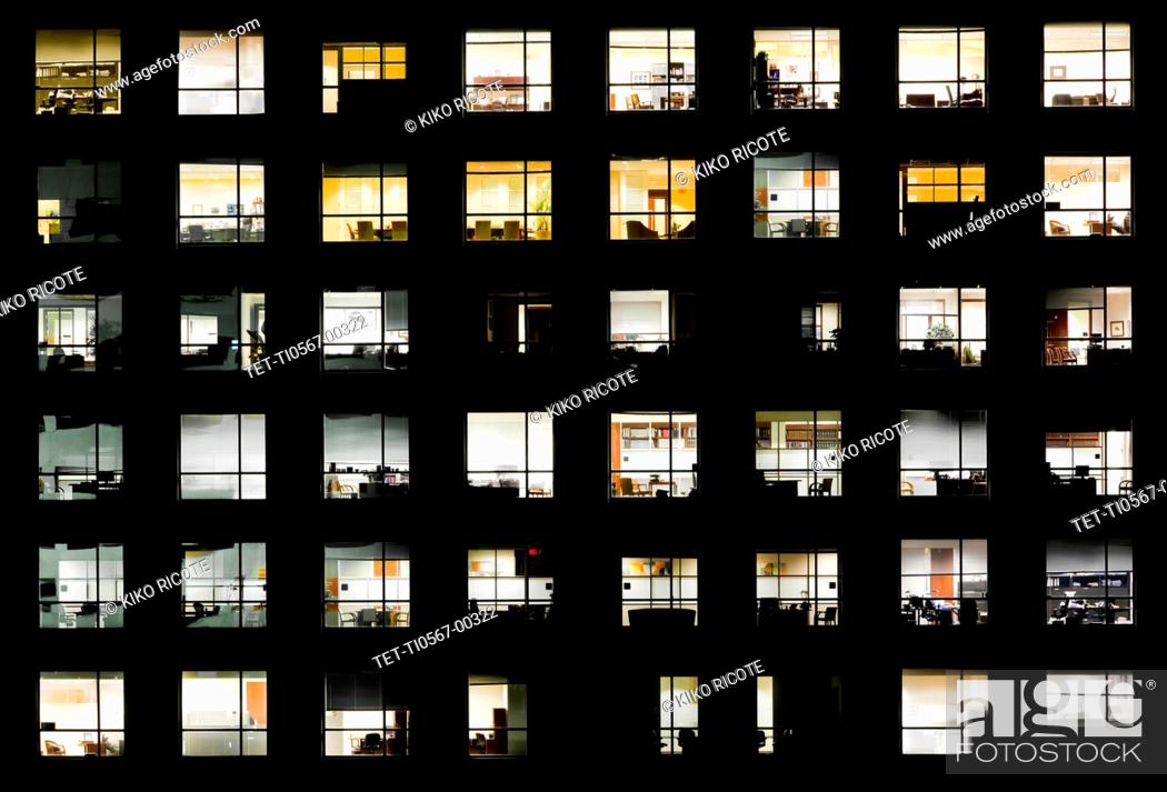 Stock Photo: Windows in Sabadell Financial Center at night in Miami, Florida.