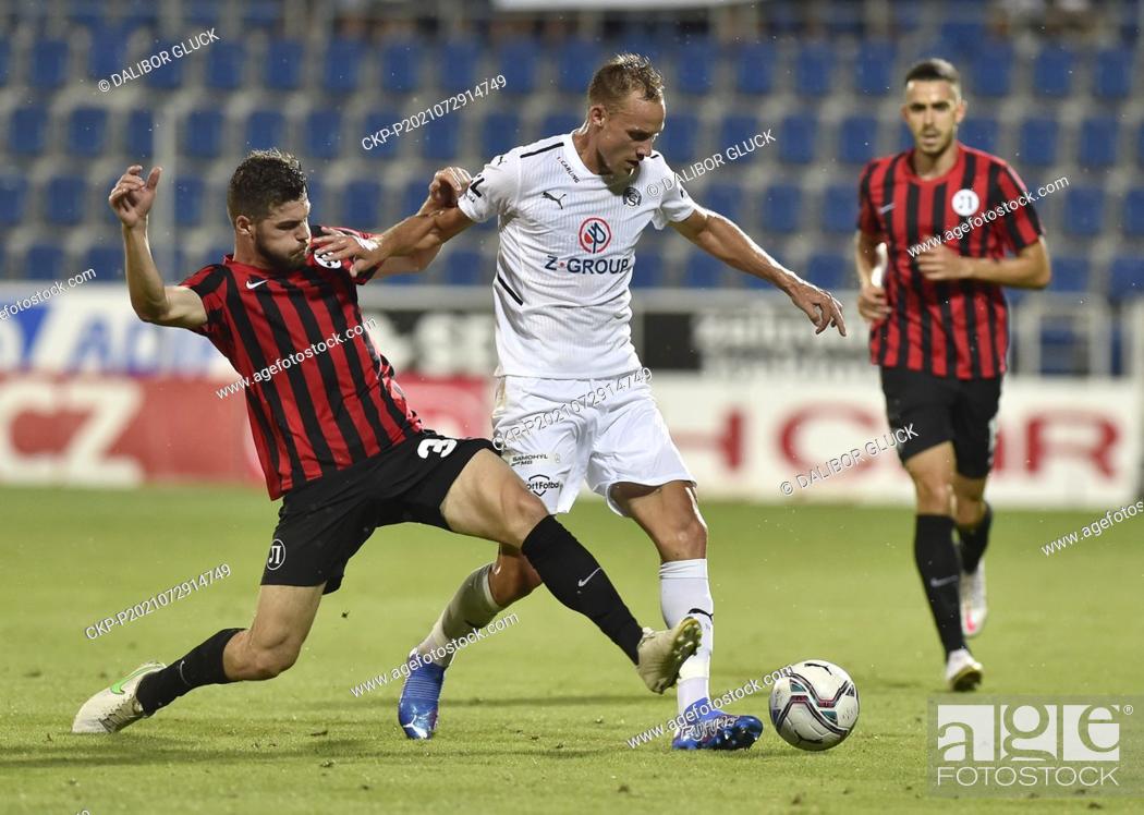 Stock Photo: From left Petar Vitanov of Lokomotiv and Josef Divisek of Slovacko in action during the UEFA Europa Conference League, 2nd round return match: FC Slovacko vs.