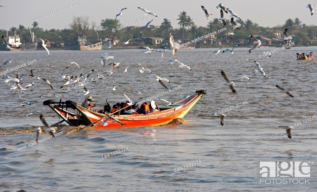 Stock Photo: Boats on irrawaddy river.