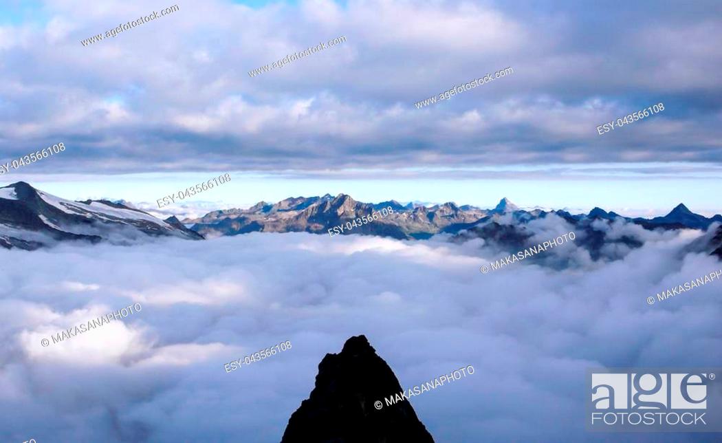 Stock Photo: mountain panorama landscape of the Bernina mountains and glaciers in the Swiss Alps near St. Moritz on a dark and ominous morning.