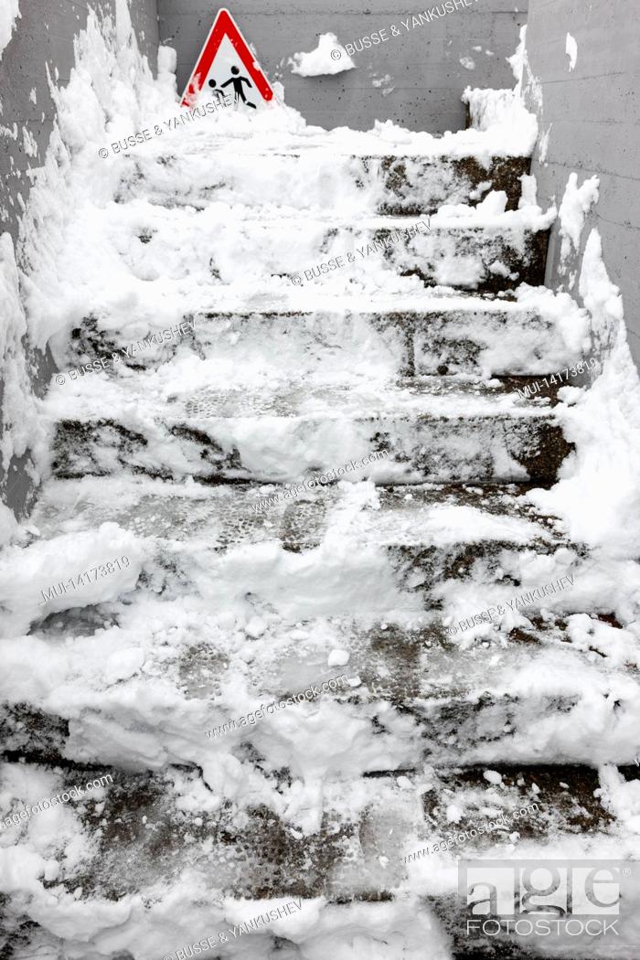 Stock Photo: Icy stairs to a residential building.