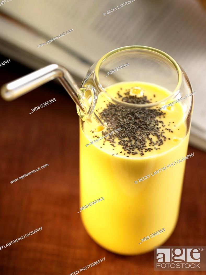 Stock Photo: batido de mango con semillas de amapola.