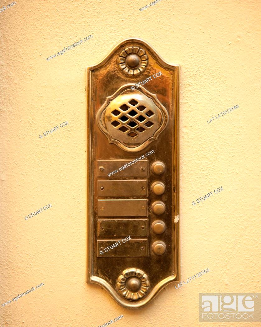 Stock Photo: The historic town of Lucca in Northern Tuscany is home to some fine examples of historic architecture including ornate door furniture.