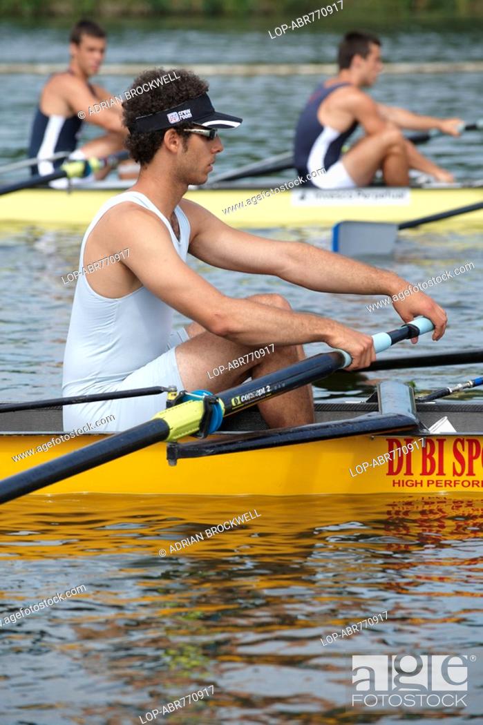 Stock Photo: England, Oxfordshire, Henley-on-Thames, Competitors preparing to race at the annual Henley Royal Regatta.