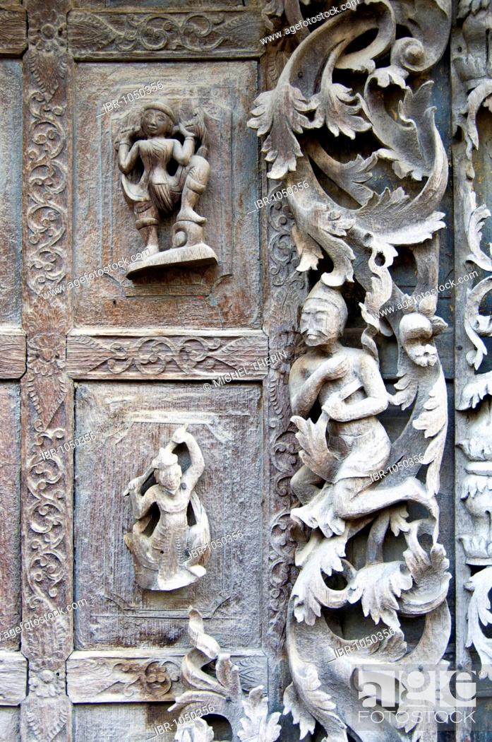 Stock Photo: Carved figures on a teak door, Monastery Shwe In Bin Kyaung, Mandalay, Burma, Myanmar, Southeast Asia.