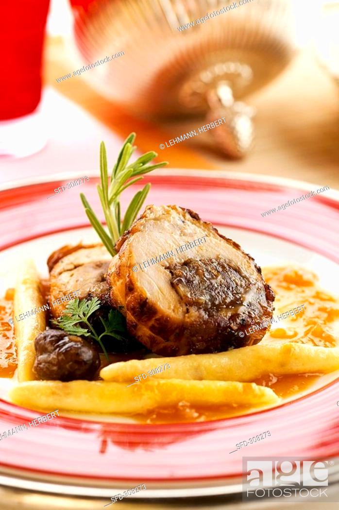 Stock Photo: Guinea fowl breast with date and chestnut stuffing.