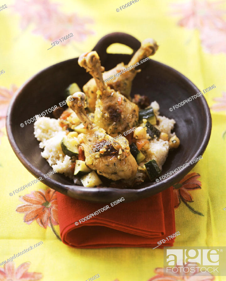 Stock Photo: Chicken and courgette tajine with couscous (1).