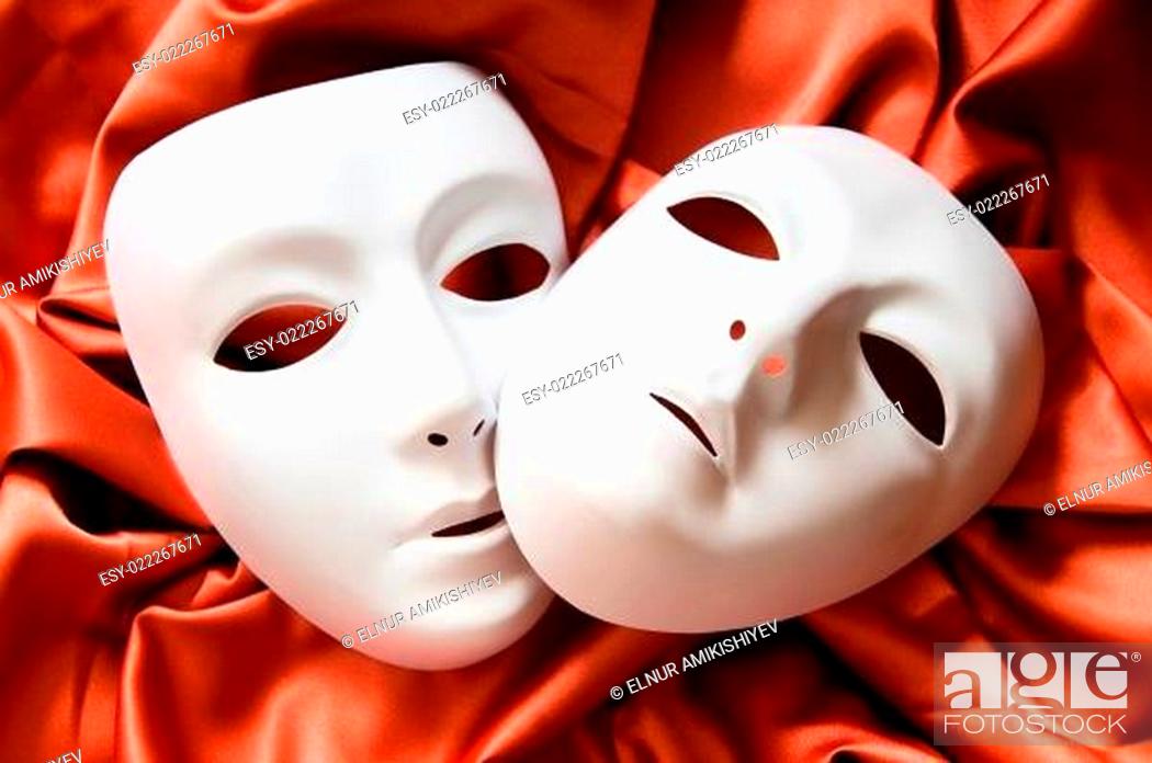 Stock Photo: Theatre concept with the white plastic masks.