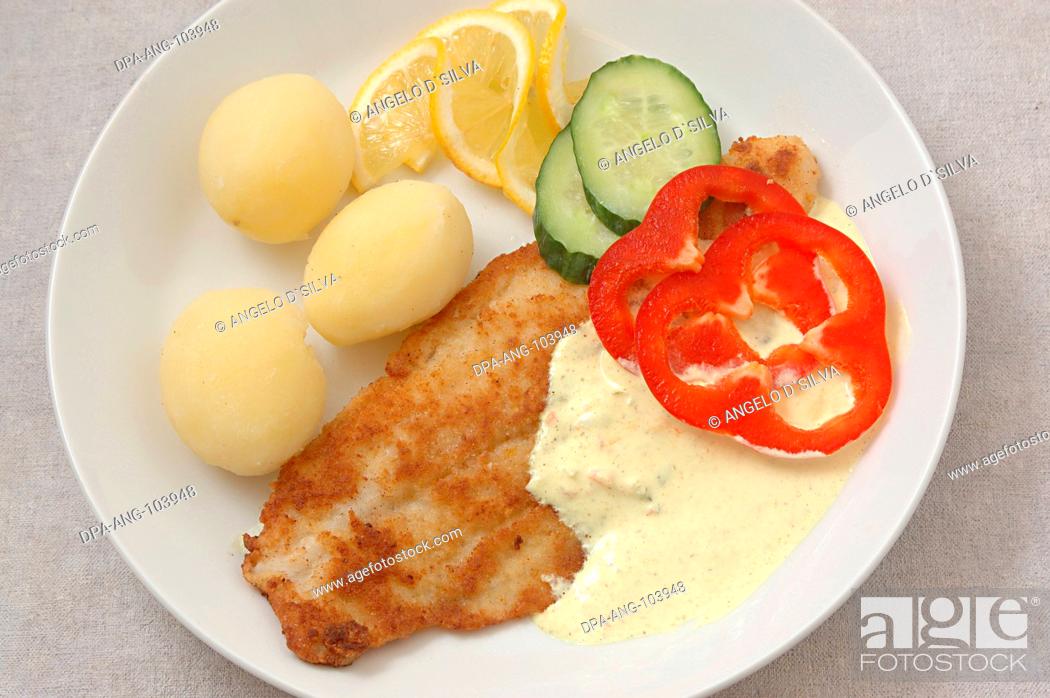Stock Photo: Food , Fried fish (Pangausuise filed Vietnamese fish farmed in rice fields ) with Danish remold sauce and cooked potatoes garnished with cucumber and red bell.
