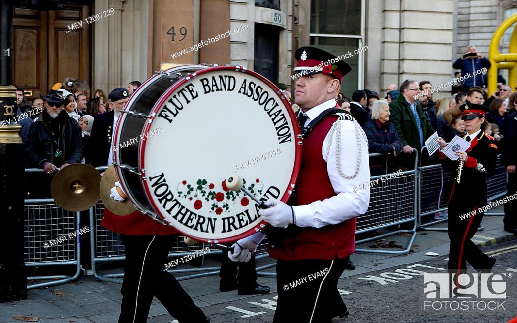 Stock Photo: London, England, UK - 11th Nov 2018. Drummer in The Flute Band Association of Ballywalter Northern Ireland marching from Admiralty Arch into Horse Guards Parade.