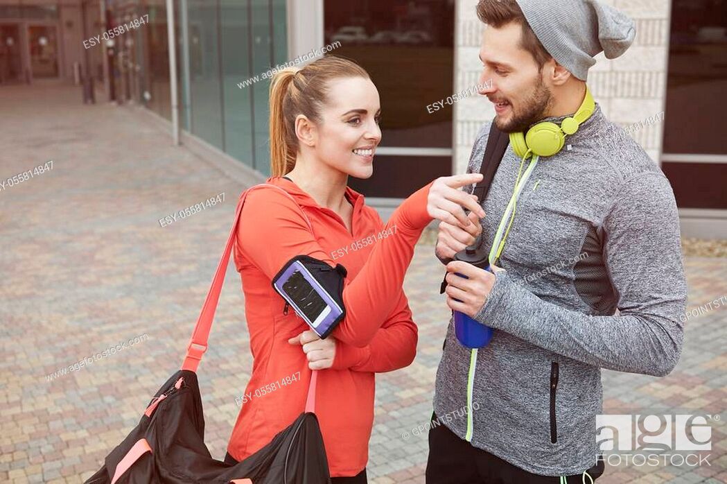 Stock Photo: Happy couple after the gym.