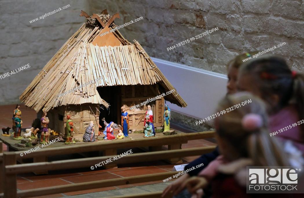 Stock Photo: 13 December 2018, Mecklenburg-Western Pomerania, Güstrow: In the North German Crib Museum in the Heilig-Geist-Kirche you can see the crib ""Mecklenburger.