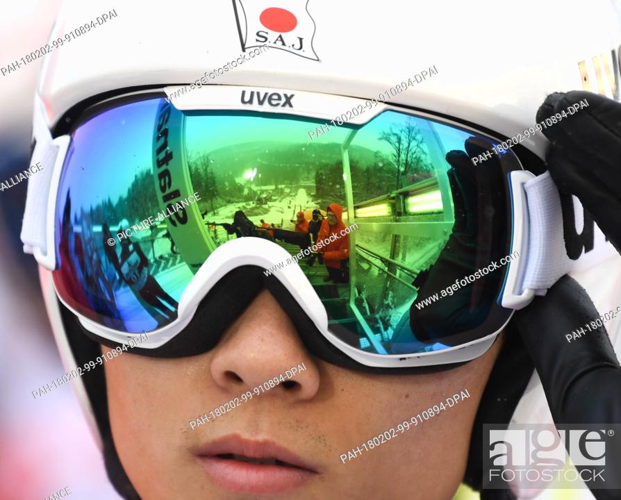 Stock Photo: Yukiya Sato of Japan preparing during a trial round for his jump from the Muehlenkopf ski jump at the Ski Jumping World Cup in Willingen, Germany.