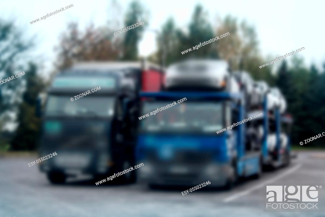 Stock Photo: Strong blurred unrecognizable truck transport on road. Transport overpasses on the highway for the transport of orders and goods.
