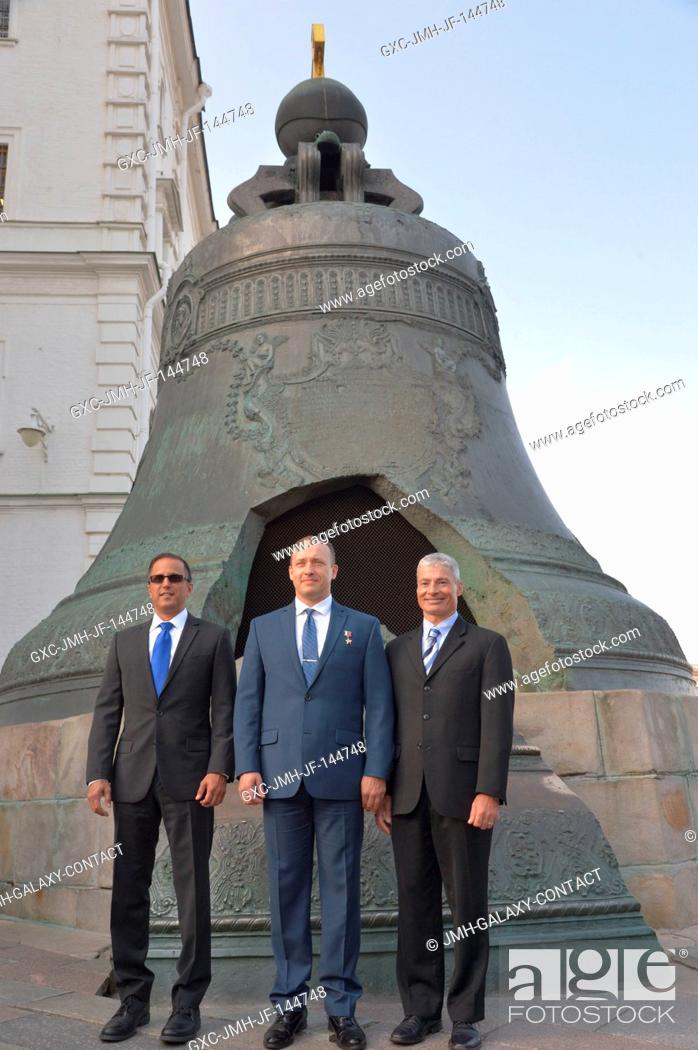 Stock Photo: Expedition 53-54 crewmembers Joe Acaba of NASA (left), Alexander Misurkin of Roscosmos (center) and Mark Vande Hei of NASA (right) pose for pictures in front of.