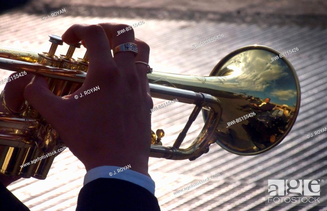 Stock Photo: Hands of a trumpet player. Mariachis in Plaza Garibaldi, Mejico, Mexico.
