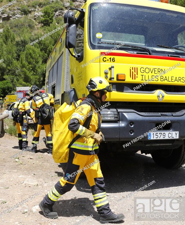Stock Photo: 09 July 2019, Spain, Escorca: A fire in Cala Tuent, Serra de Tramuntana has burned some about 33 hectares of pine forest in Mallorca Its the first major fire.