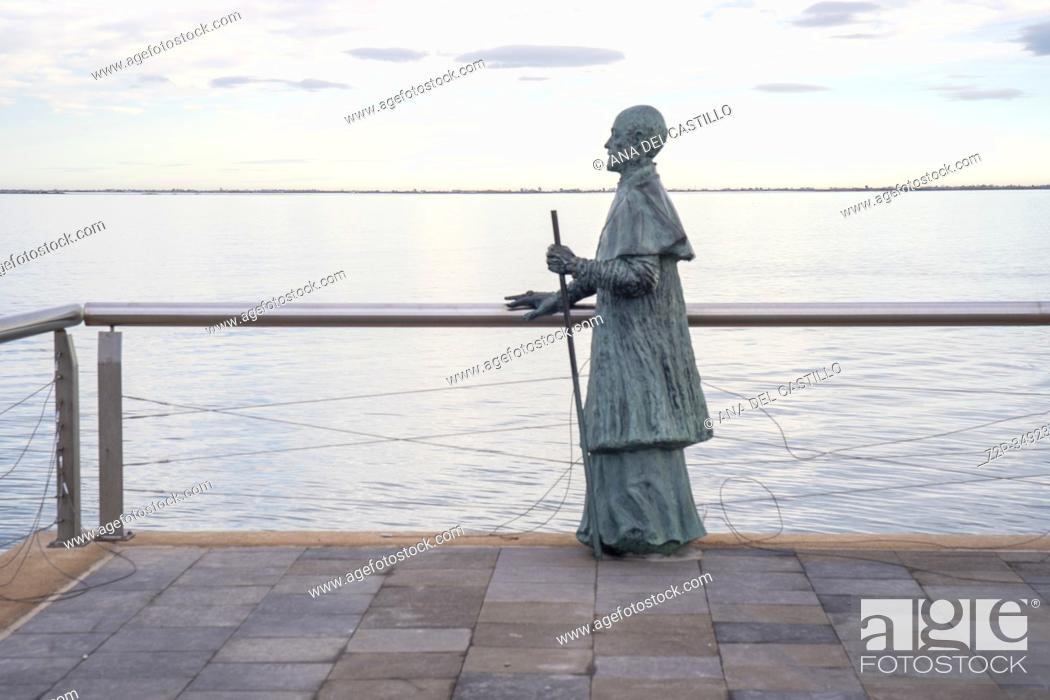 Stock Photo: Ampolla de Mar Tarragona Catalonia Spain on January 28, 2020: Adriano pope statue on promenade.