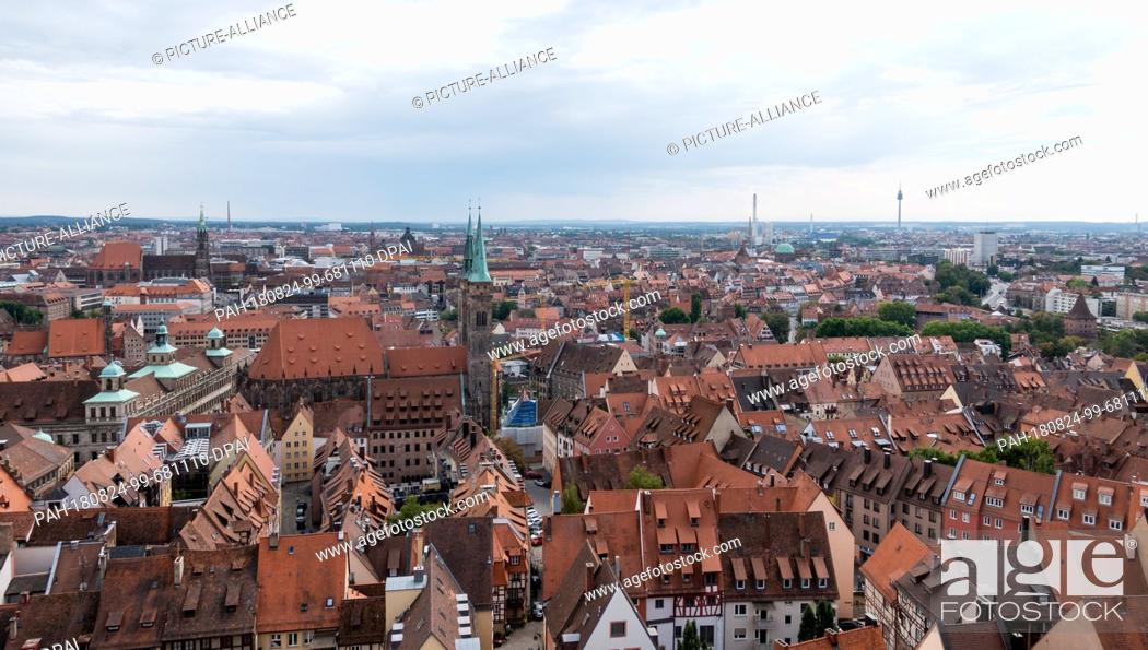 Stock Photo: 22 August 2018, Germany, Nuremberg: Panoramic view in south-southwest direction over the old town. Photo: Daniel Karmann/dpa.