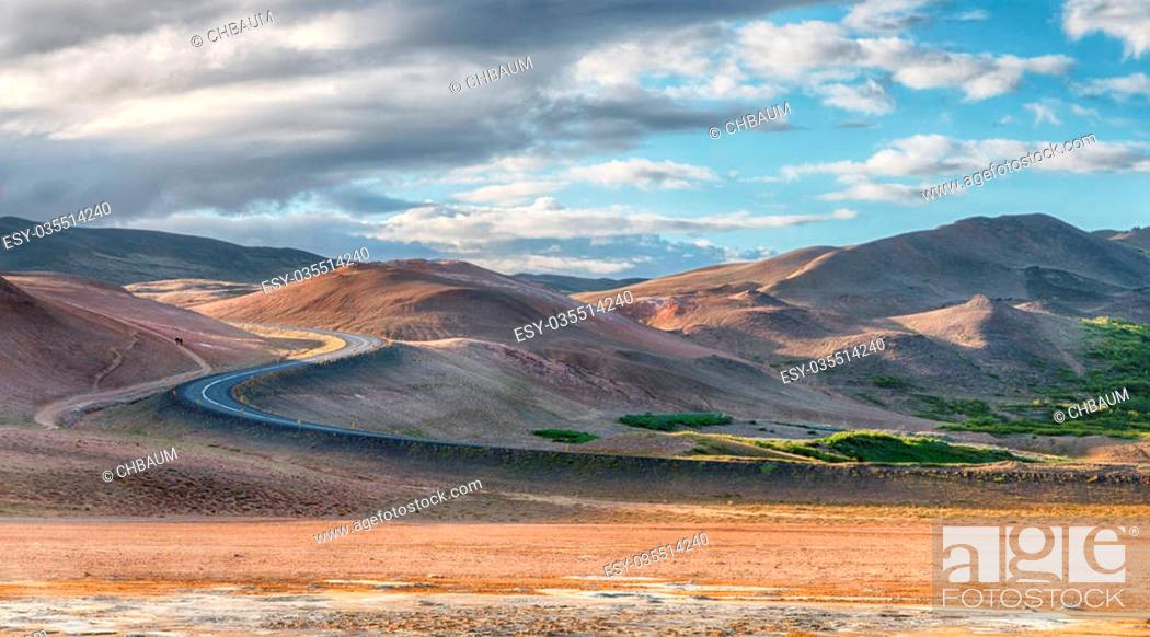 Stock Photo: Lonesome road to the Hverir solfatara fields in Kafla mountains, Iceland, HDR.