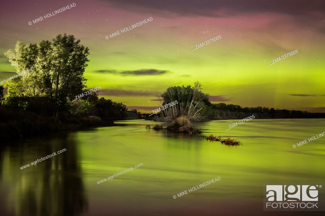 Stock Photo: Nothern lights dance above the Iowa landscape.