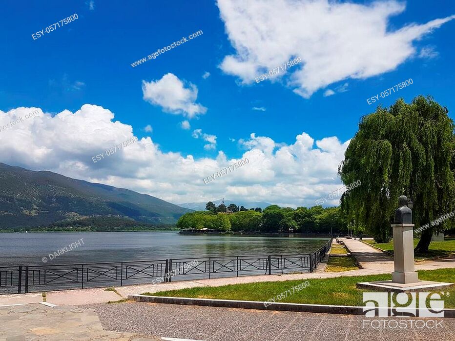 Stock Photo: Giannena city in spring time lake Pamvotis clouds trees colors sunny day Greece.