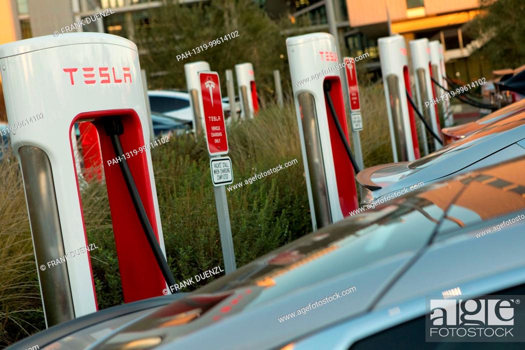 Stock Photo: Tesla Supercharger station stalls at the Qualcomm parking lot in Sorrento Valley, where many high tech, biotech, and IT companies are located, in Febuary 2018.