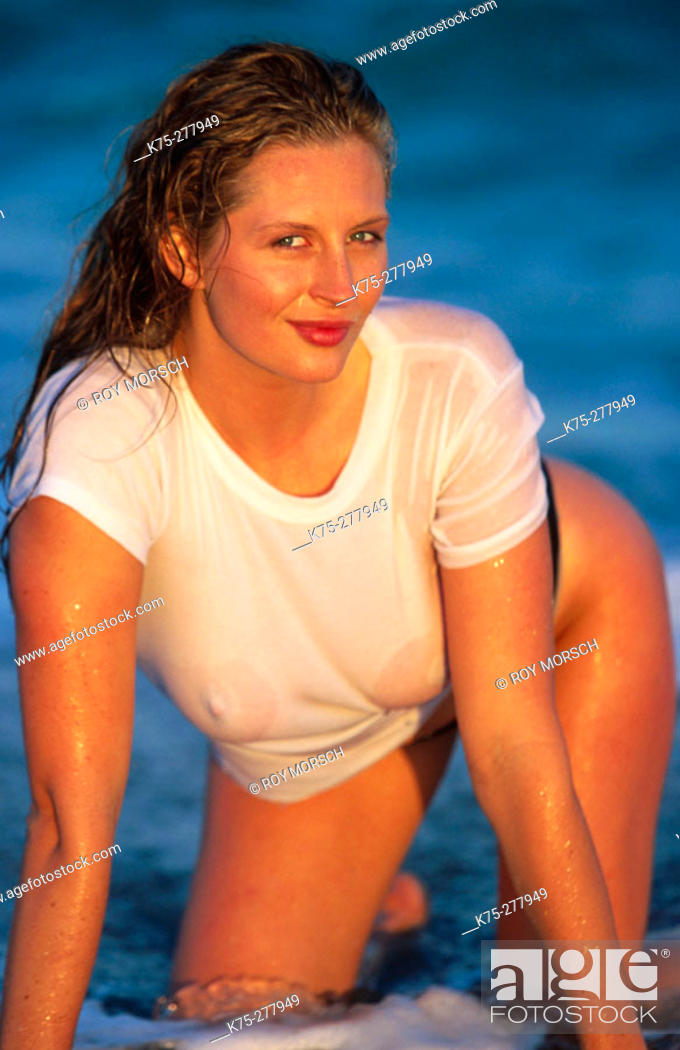sexy girl in wet tee shirt, Stock Photo, Picture And Rights Managed Image.  Pic. K75-277949 | agefotostock